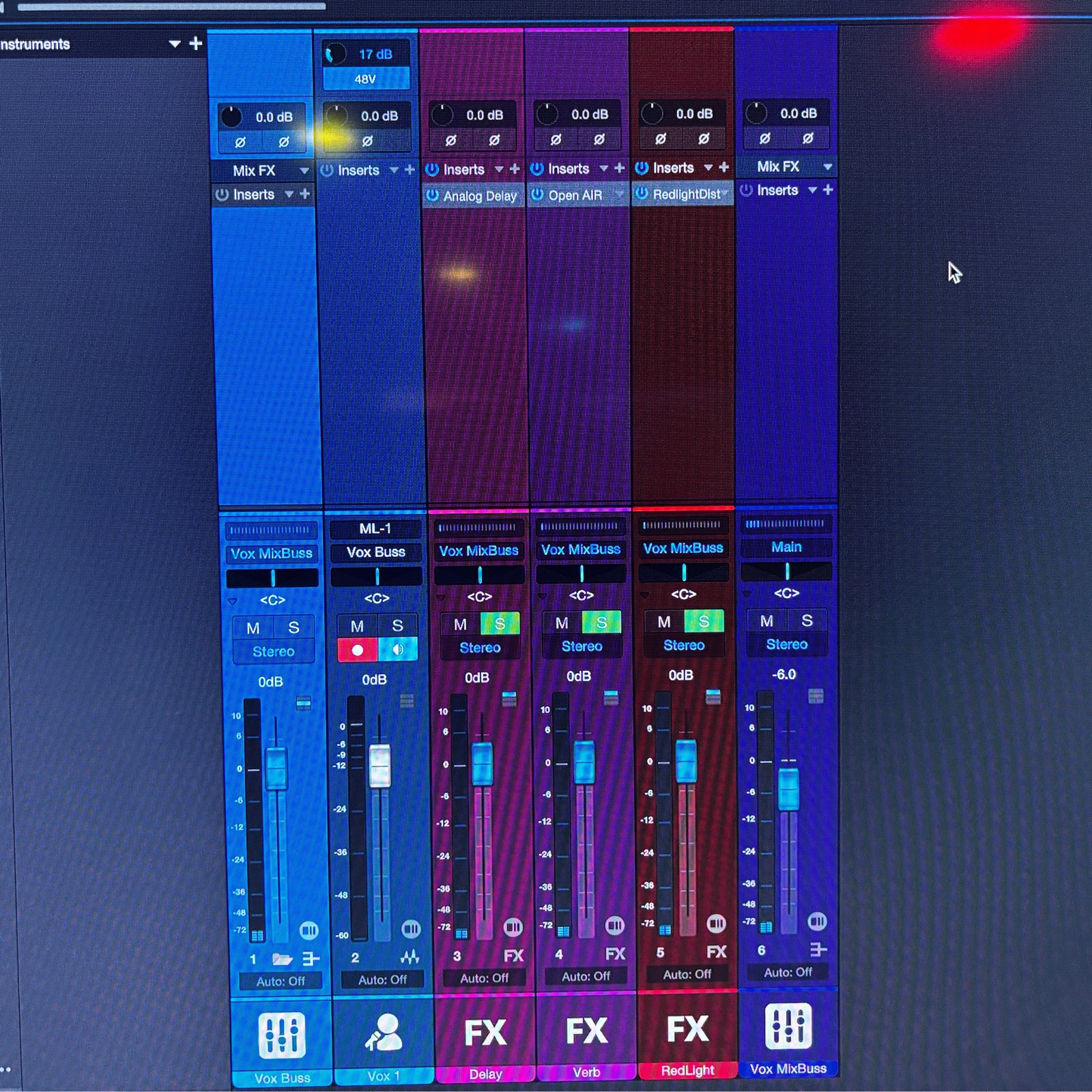 DAW session view with a lead vocal chain loaded in the mixer
